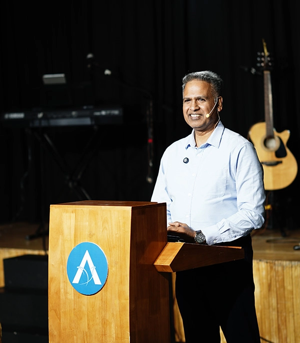A presentation being made to a church elder during a service at Abundant Life Fellowship, Kuwait.